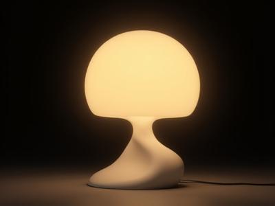 Sculptural table lamp with a soft, diffused light.